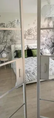 a room with a bunk bed in a room at 2 pièces au calme avec terrasse et climatisation in Nice