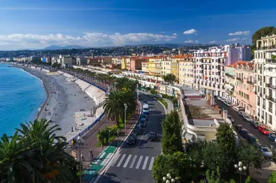 a view of a city with a beach and buildings at Villa moderne avec piscine vue mer à Nice Bellet in Nice