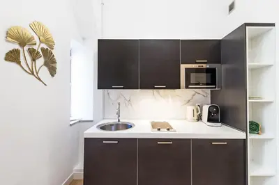 a kitchen with a sink and a microwave at The Calypso - Quiet - New - Central in Nice