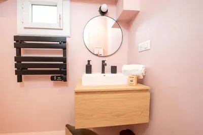 a bathroom with a sink and a mirror at #30 Old Town, Castle panoramic View / Terrace & AC in Nice