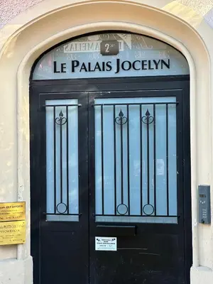 a black door with a sign above it at STUDIO REFAIT A NEUF CENTRE DE NICE in Nice