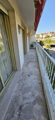 a balcony of a building with a walkway at bella d'azur in Nice