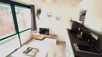 a room with a desk with a computer and a window at Dana centre mer 25 in Nice