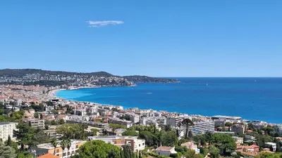 an aerial view of a city and the ocean at Chambre d'hôtes pleine vue mer in Nice