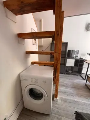 a washer and dryer in a room at Berlioz TERRASSE in Nice