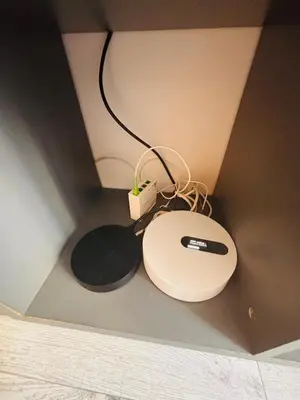 a computer mouse sitting on the floor in a room at Berlioz TERRASSE in Nice