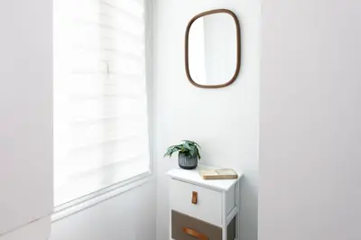 a mirror on a white wall next to a window at L26 Old Town central 5mins walk to Sea front AC WIFI in Nice