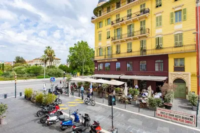 a building with motorcycles parked in front of a building at L26 Old Town central 5mins walk to Sea front AC WIFI in Nice