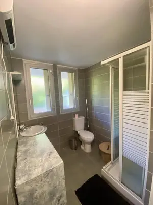 a bathroom with a toilet and a sink and a shower at Nice ouest-Cosy Studio, Clim Wifi in Nice