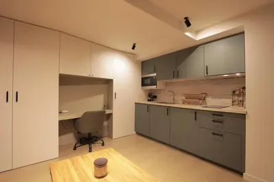 a kitchen with a desk and a chair in it at Fully equiped newly refurbished studio with an incredible view in Nice in Nice