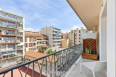 a balcony with a view of some buildings at Suite Grand Sud FSHH in Nice