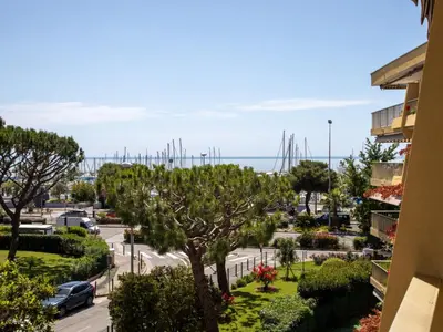 a view of a parking lot with a marina at Studio le ponant by Interhome in Saint-Laurent-du-Var