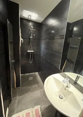 a bathroom with a sink and a shower at Villa Nice in Nice