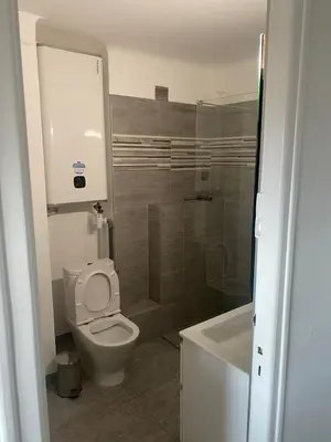 a bathroom with a toilet and a shower and a sink at Nice apartment - Valrose - Cosy & Chill in Nice