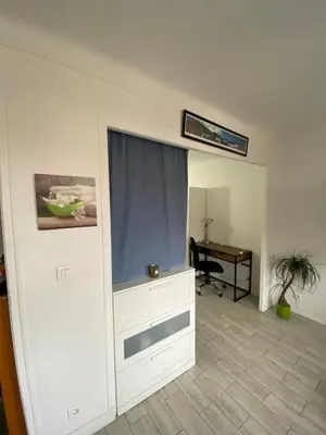 a living room with a tv and a desk at Nice apartment - Valrose - Cosy & Chill in Nice