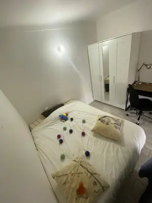 a bedroom with a bed with decorations on it at Nice apartment - Valrose - Cosy & Chill in Nice