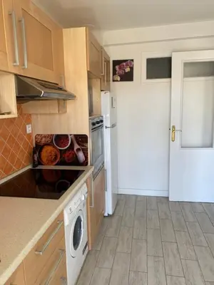 a kitchen with a stove and a washer and dryer at Nice apartment - Valrose - Cosy & Chill in Nice