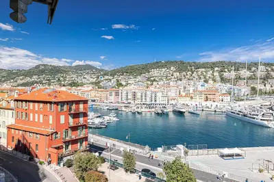 a view of a harbor with boats in the water at FEEL HOME - VISTA Di PORTU in Nice