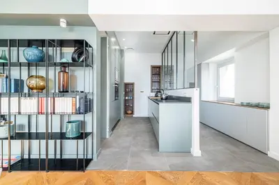 a hallway with glass shelves in a house at FEEL HOME - VISTA Di PORTU in Nice