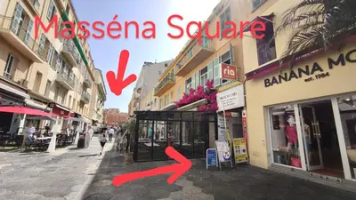 a street with a sign that reads masseinaya square at Apartment Massena - super central in Nice