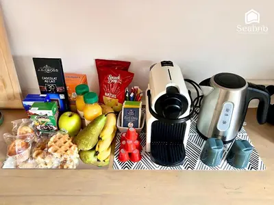 a coffee maker sitting on top of a table with food at Little Nest - Old Town - Breakfast - Wifi - AC in Nice