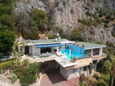 an aerial view of a house with a swimming pool at Eze sur mer - vue Saint Jean Cap Ferrat in Èze