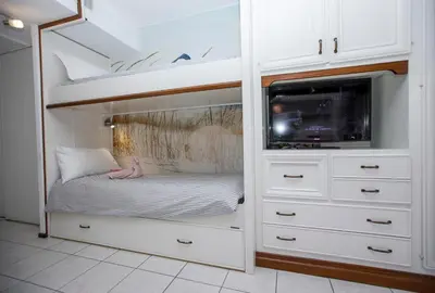 a closet with a bunk bed and a tv at Studio palais des arts in Nice