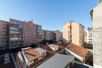 an overhead view of a city with buildings and roofs at 253 MONT BORON - Appartement 2p - Balcon plein sud - Climatisation in Nice