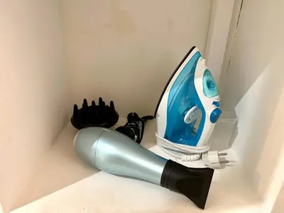 a largeumedumed toothbrush in a corner of a wall at Studio Cosy à Nice Centre in Nice