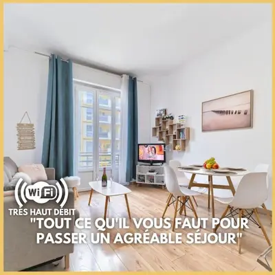 a living room with a couch and a table at CENTRE VILLE - SUPERBE APPARTEMENT CLIMATISE - COSY-Wifi - in Nice