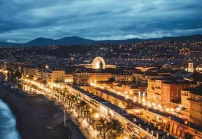a city lit up at night with street lights at CENTRE VILLE - SUPERBE APPARTEMENT CLIMATISE - COSY-Wifi - in Nice