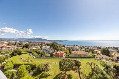 an aerial view of a park with the ocean in the background at Les Belles Terres - Résidence avec piscine vue mer in Nice