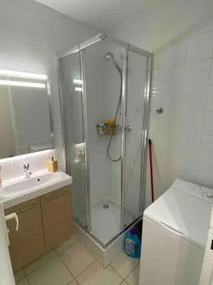 a bathroom with a shower and a sink at Logement proche de la plage in Nice