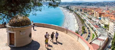 a group of people standing on a tower looking at a beach at Art Studio Nice in Nice