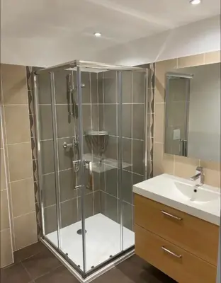 a bathroom with a shower and a sink at DOMAINE LOU BEL AZUR - Elégant in Saint-Laurent-du-Var