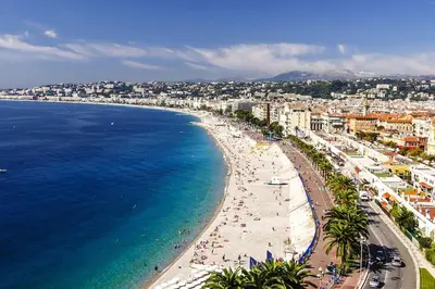 an aerial view of a beach and the ocean at Large flat terrace Sea view, Promenade des Anglais in Nice