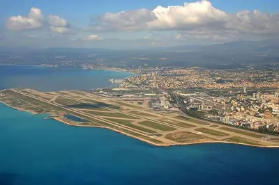 an aerial view of an island in the water at Large flat terrace Sea view, Promenade des Anglais in Nice