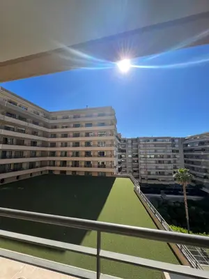 a view of a building from a balcony at Studio Palais de la Méditerranée in Nice