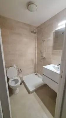 a bathroom with a toilet and a sink at Petit studio promenade des Anglais in Nice