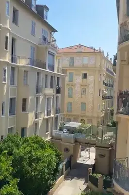 a view from a balcony of two buildings at Studio Hérold - Évasion avec Terrasse à Nice in Nice