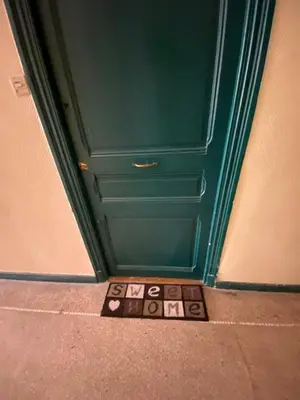 a welcome mat in front of a door with a welcome sign at Studio Hérold - Évasion avec Terrasse à Nice in Nice