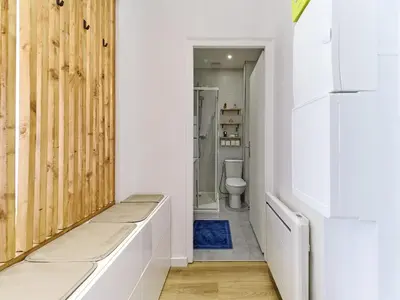 a bathroom with white walls and a toilet at City Center - Magnificent Apartment - Cozy - Wifi in Nice