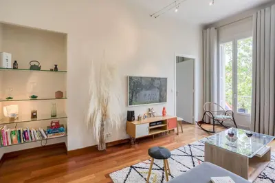 a living room with white walls and a glass table at #27 Urban Suite AC 2 Bedrooms 10mins Walk Sea&Old Town in Nice
