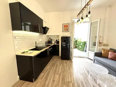 a kitchen with a sink and a refrigerator at ApartHotel Riviera - TERRASSE HORIZON - 15' Promenade des Anglais in Nice