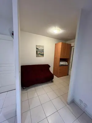 a bedroom with a red bed in a room at Magnifique 2 pièces centre Nice in Nice