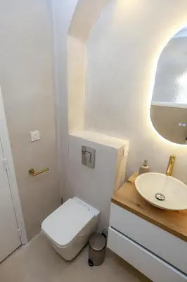 a bathroom with a white toilet and a sink at Nice carré d'or proche Negresco in Nice