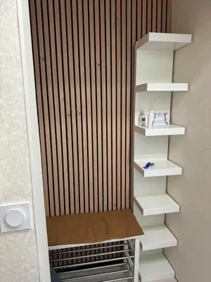 a closet with a bench in a room at Anahit in Nice