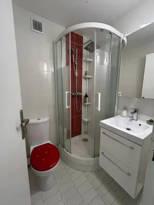 a bathroom with a shower and a toilet and a sink at Calm#Child friendly#Home#Beach#Airport in Saint-Laurent-du-Var