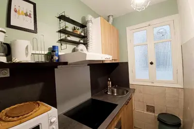 a small kitchen with a sink and a stove at Charming T2 apartment in Nice city center in Nice