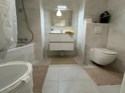 a bathroom with a toilet and a sink and a tub at Fabron Hills By Avecoeur in Nice